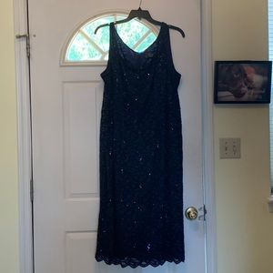 Beautiful and Elegant sleeveless blue sequined dress by Alex Evenings.